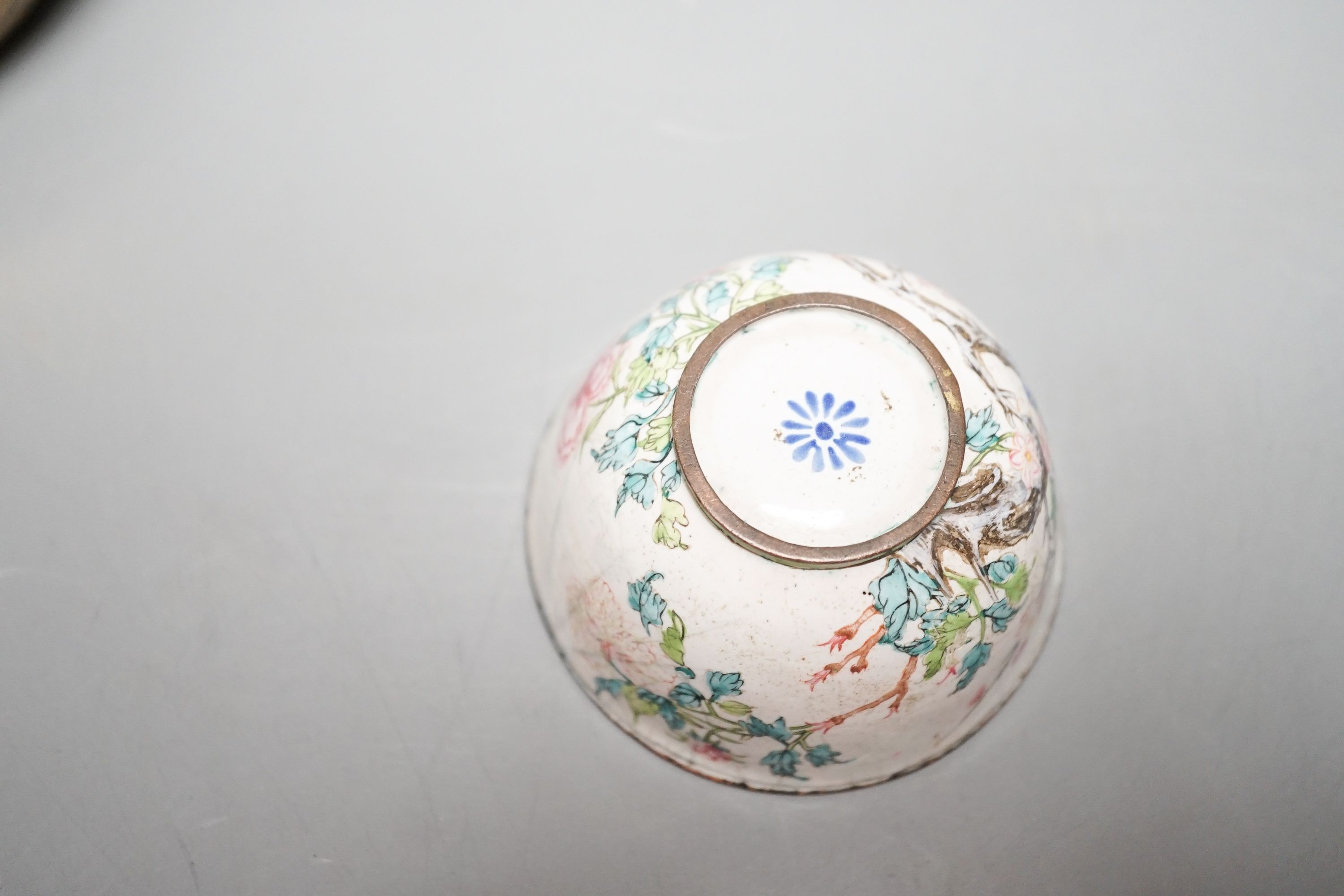 A Chinese bronze hand warmer, 11.3cm and an 18th century Chinese Canton enamel cup